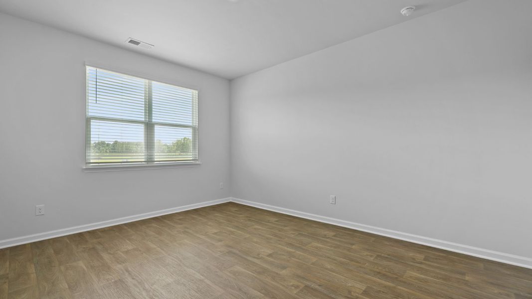 Spacious, unfurnished interior of a new home in Pine Hills at Cane Bay, Summerville (Image 17).