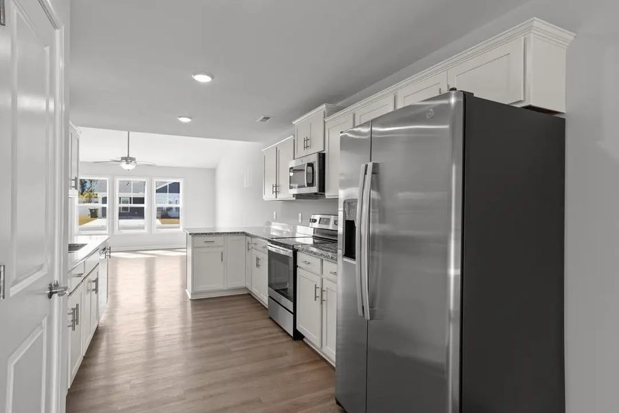 Furnished interior in a model home at The Villas in Newport (Image 9).