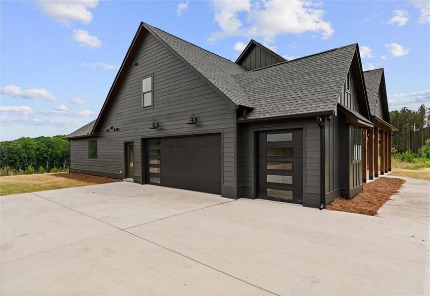Front exterior of a new home in , Buchanan, GA, highlighting curb appeal (Image 1). Front exterior of a new home in , Buchanan, GA, highlighting curb appeal (Image 1).
