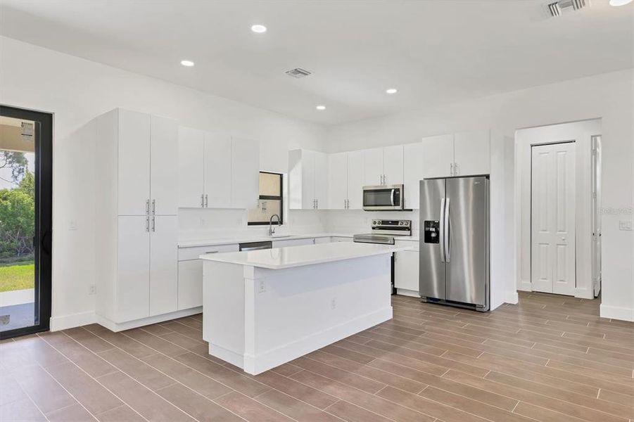 Furnished interior view inside a new home in , Port Charlotte (Image 4). Furnished interior view inside a new home in , Port Charlotte (Image 4).