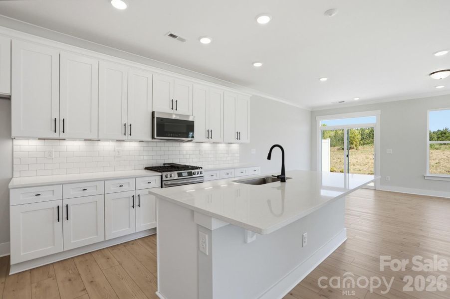 Furnished interior view inside a new home in Blythe Mill Townhomes, Waxhaw (Image 8).