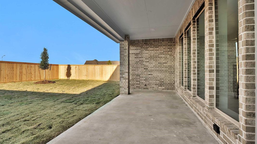Exterior details and patio area of a home in Bridgeland 50', Cypress (Image 4).