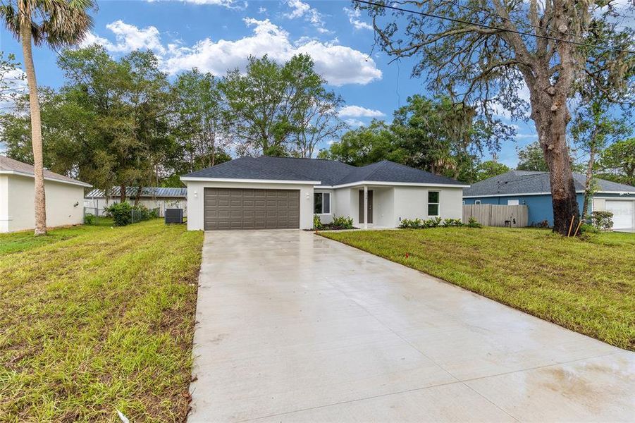 Front exterior of a new home in , Ocala, FL, highlighting curb appeal (Image 30).