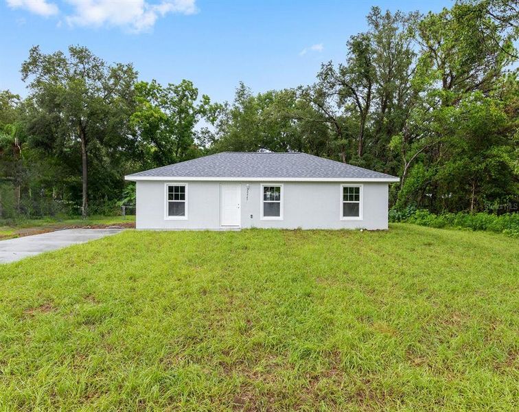 Front exterior of a new home in , Dunnellon, FL, highlighting curb appeal (Image 14). Front exterior of a new home in , Dunnellon, FL, highlighting curb appeal (Image 14).