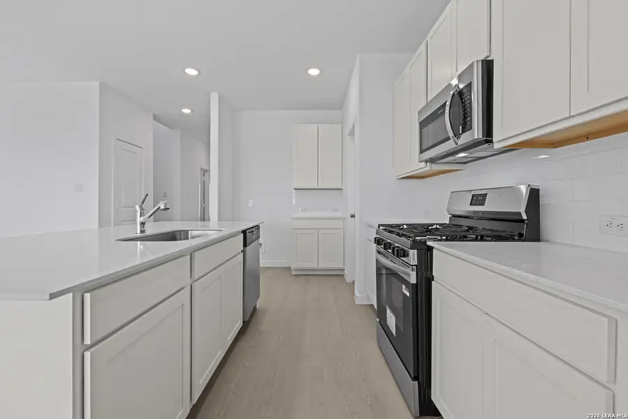 Furnished interior view inside a new home in , New Braunfels (Image 7).