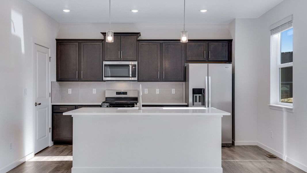 Furnished interior view inside a new home in Trails at Crowfoot, Parker (Image 5).