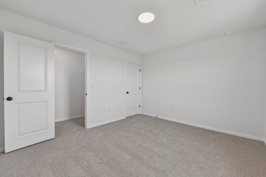 Spacious, unfurnished interior of a new home in Saddle Ridge at Wildhorse Ranch, Austin (Image 19).