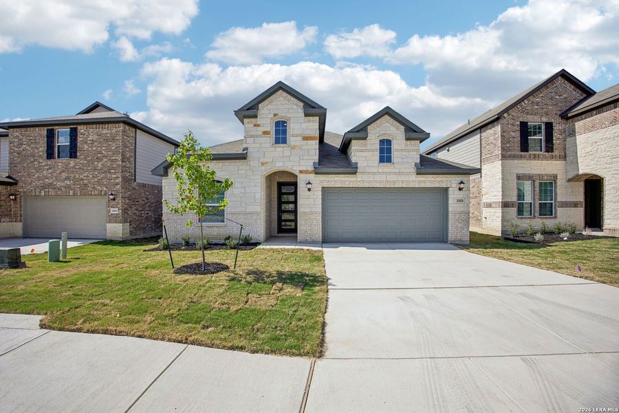 Front exterior of a new home in Sagebrooke - Classic Series, San Antonio, TX, highlighting curb appeal (Image 26).