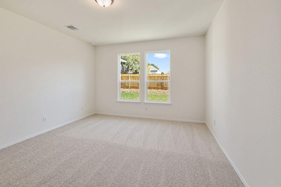 Spacious, unfurnished interior of a new home in River Bluff, Leander (Image 28).