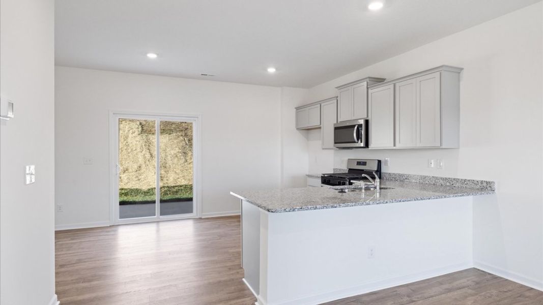 Representative furnished interior of a home built from the Glendale by D.R. Horton in Mary's Pointe, Clinton (Image 6).