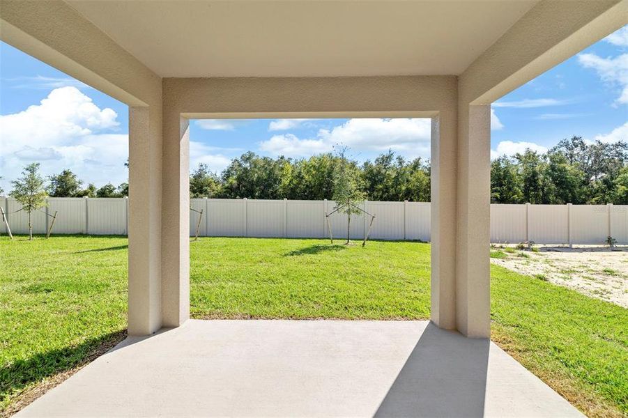 Exterior details and patio area of a home in Preservation Pointe, Davenport (Image 2). Exterior details and patio area of a home in Preservation Pointe, Davenport (Image 2).