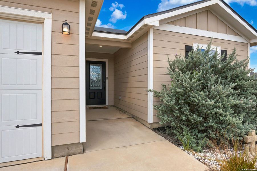 Exterior details and patio area of a home in Rosewood Estates, Lytle (Image 20).