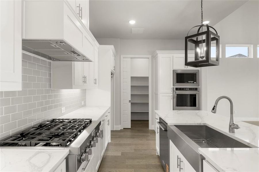 Furnished interior view inside a new home in Painted Tree Showcase, McKinney (Image 11).