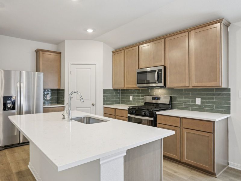 Furnished interior view inside a new home in Prairie Winds - Reserve Collection, Hutto (Image 7).