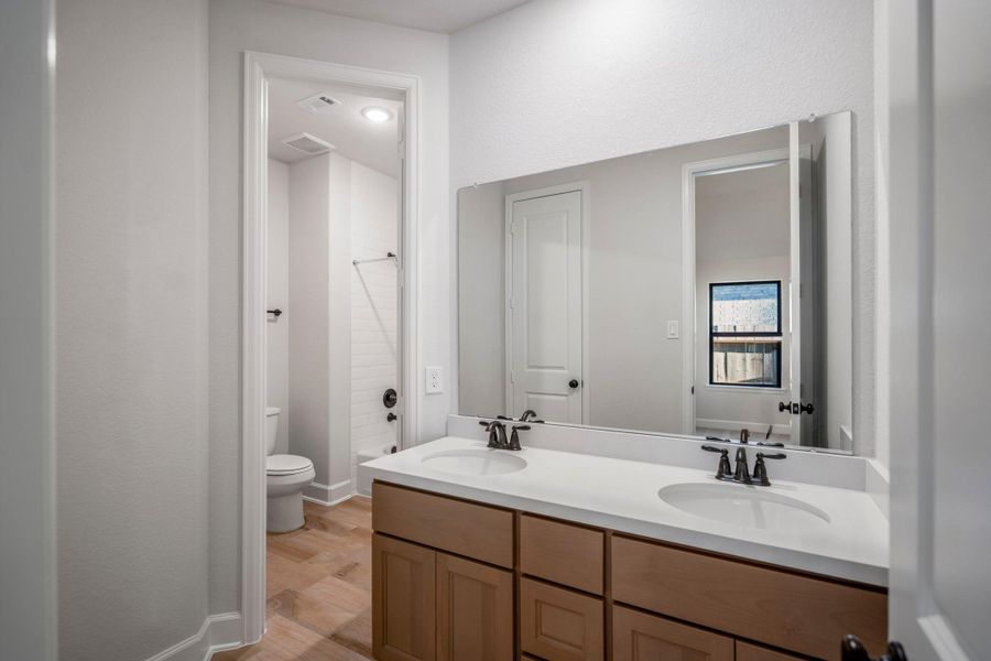 Furnished interior view inside a new home in Jordan Ranch 70' Lots, Fulshear (Image 12).