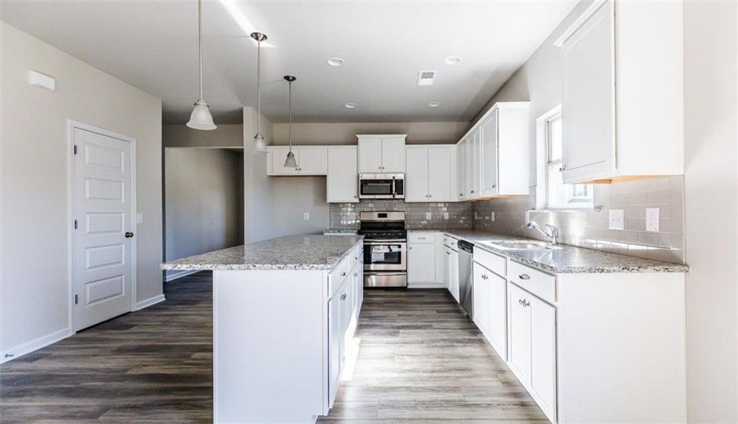 Furnished interior view inside a new home in Summerfield Place, Carrollton (Image 6).