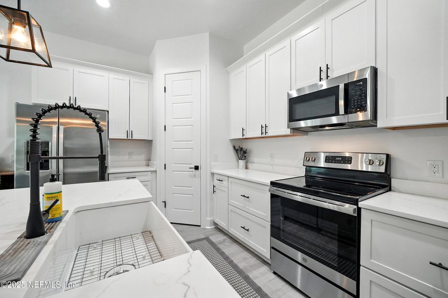 Furnished interior view inside a new home in , Jacksonville (Image 7). Furnished interior view inside a new home in , Jacksonville (Image 7).