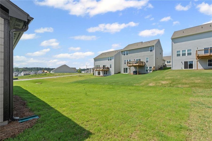 Front exterior of a new home in Twin Lakes, Hoschton, GA, highlighting curb appeal (Image 21).