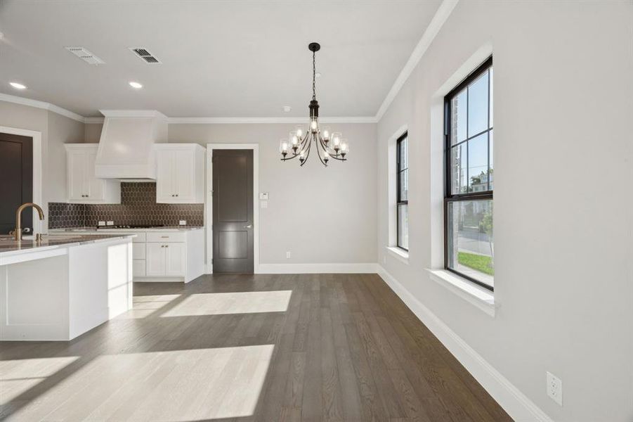 Dining room adjacent to kitchen.