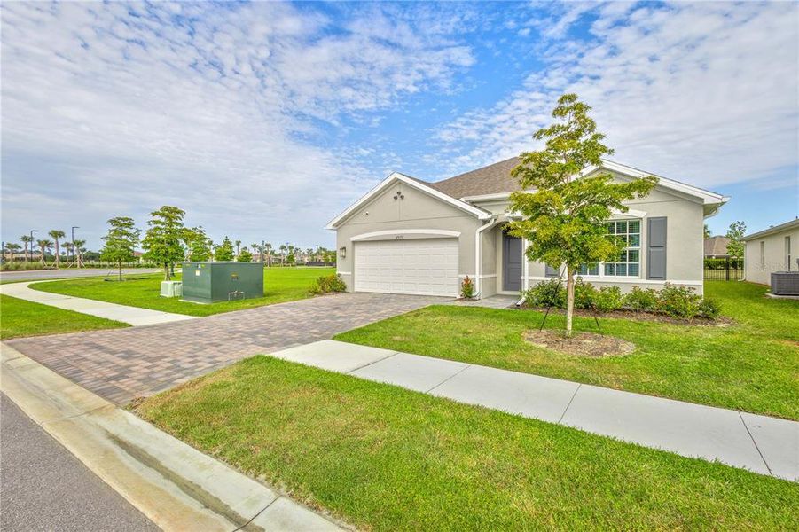 Front exterior of a new home in , North Port, FL, highlighting curb appeal (Image 21).
