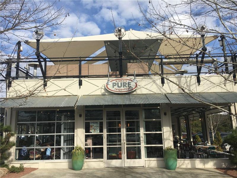Front exterior of a new home in Winsome Park, Woodstock, GA, highlighting curb appeal (Image 2).