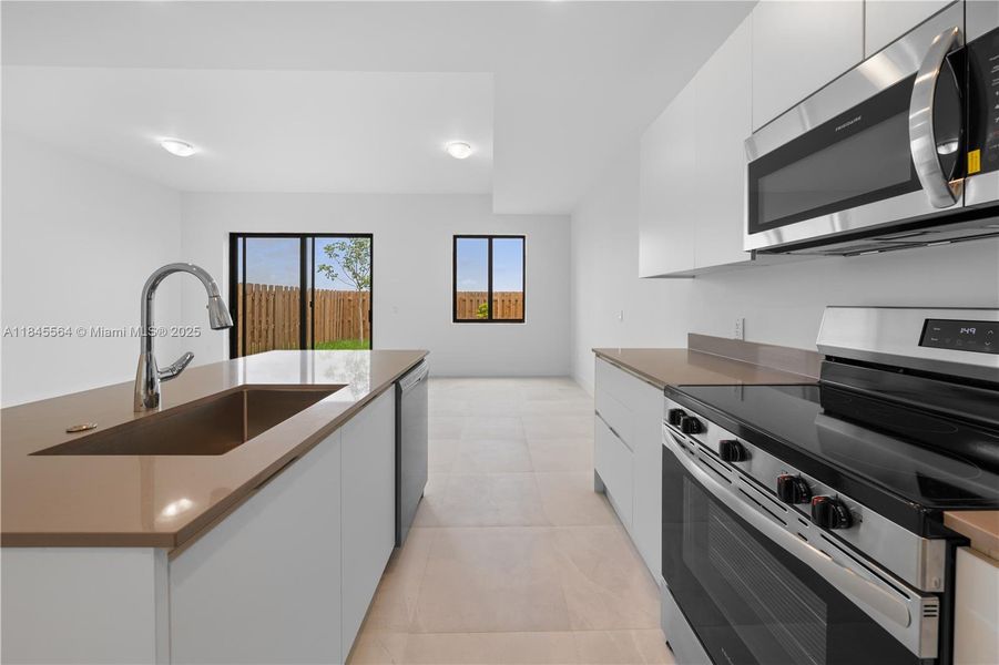 Furnished interior view inside a new home in , Florida City (Image 11).