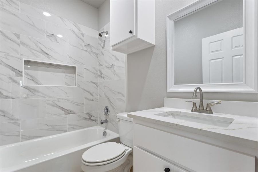 Leaving room Bathroom featuring  shower combination and vanity