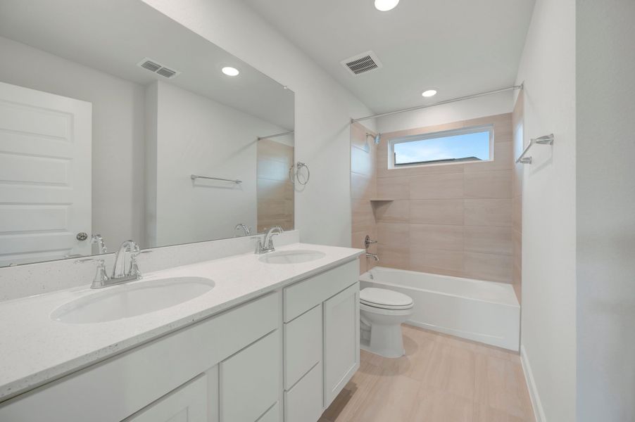 Furnished interior view inside a new home in Mason Woods, Cypress (Image 11).