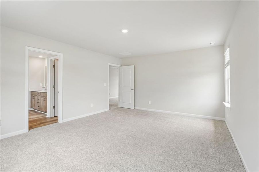 Spacious, unfurnished interior of a new home in Northwoods at Mirror Lake, Villa Rica (Image 58).