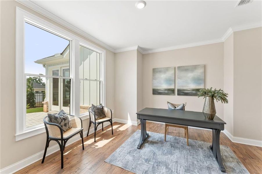 Furnished interior view inside a new home in The Courtyards of Franklin Goldmine, Cumming (Image 9).
