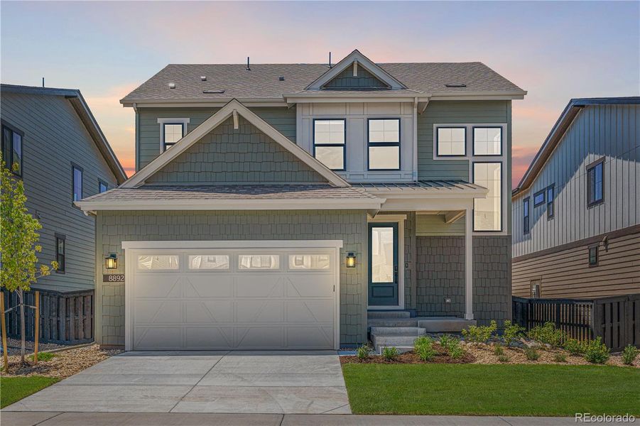 Front exterior of a new home in Harmony at Solstice, Littleton, CO, highlighting curb appeal (Image 2). Front exterior of a new home in Harmony at Solstice, Littleton, CO, highlighting curb appeal (Image 2).