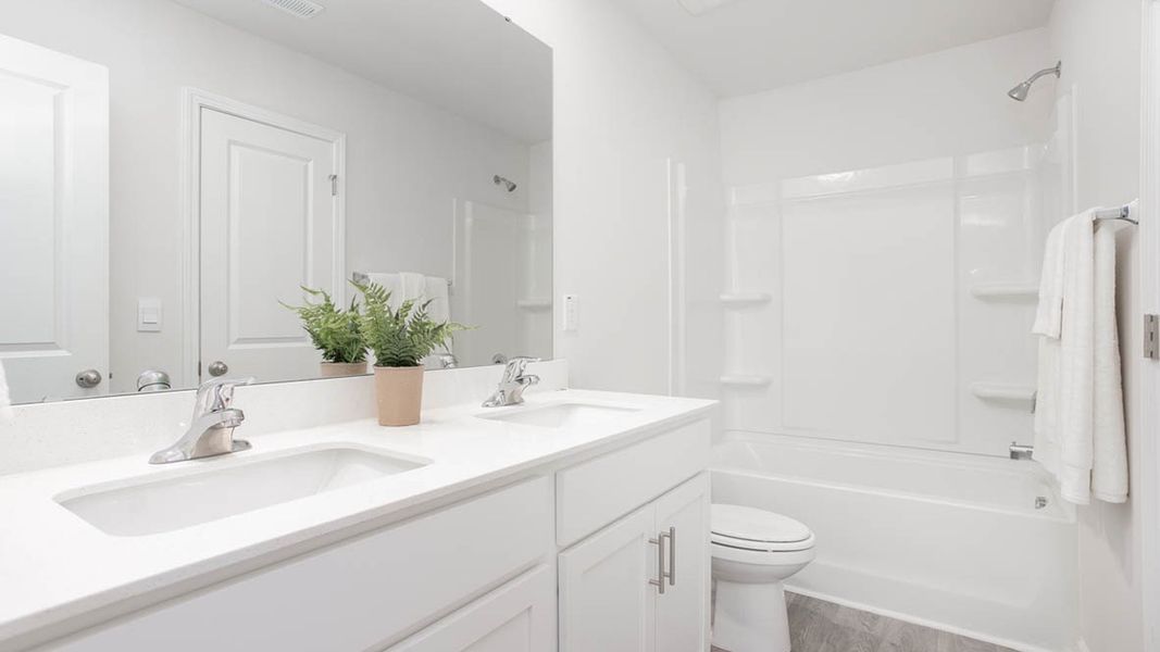 Representative furnished interior of a home built from the KYLE by D.R. Horton in Hudson Glen, Mocksville (Image 15).