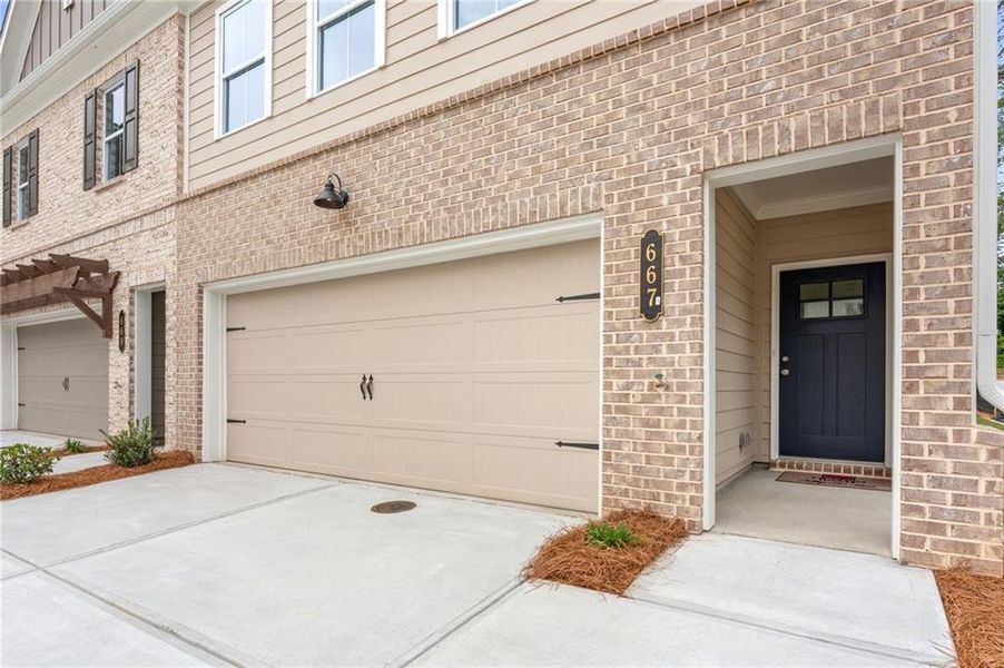Exterior details and patio area of a home in River Walk Place, Lawrenceville (Image 3).