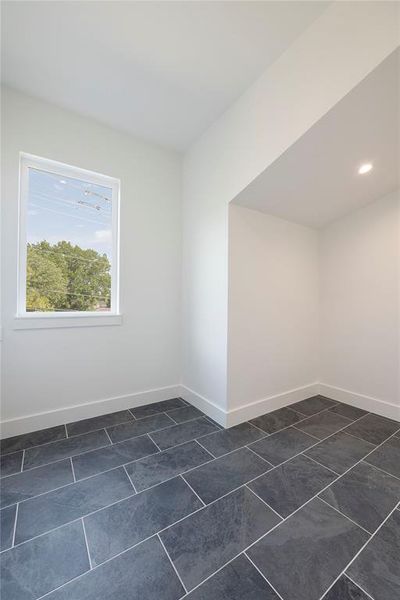 View of tiled spare room