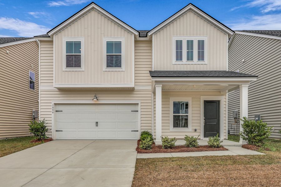 Front exterior of a new home in Sweetgrass at Summers Corner: Carolina Collection, Summerville, SC, highlighting curb appeal (Image 2).