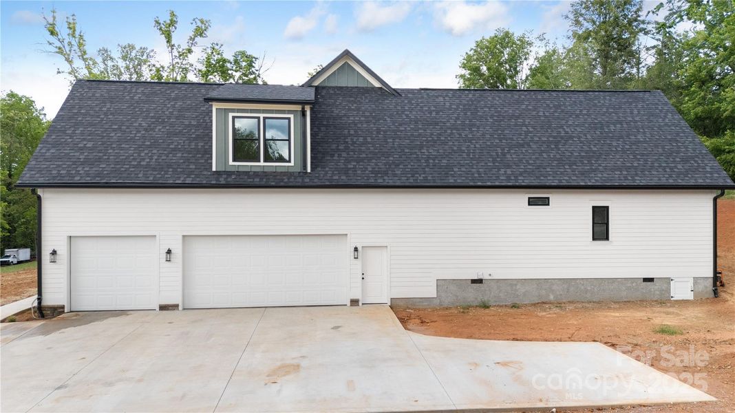 Front exterior of a new home in , Hendersonville, NC, highlighting curb appeal (Image 25). Front exterior of a new home in , Hendersonville, NC, highlighting curb appeal (Image 25).