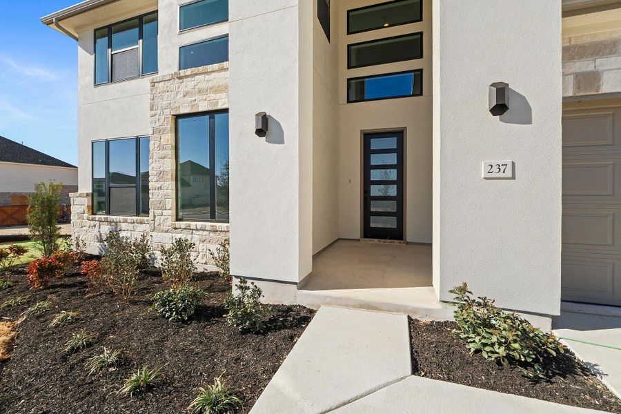 Exterior details and patio area of a home in Lariat, Liberty Hill (Image 3). Exterior details and patio area of a home in Lariat, Liberty Hill (Image 3).