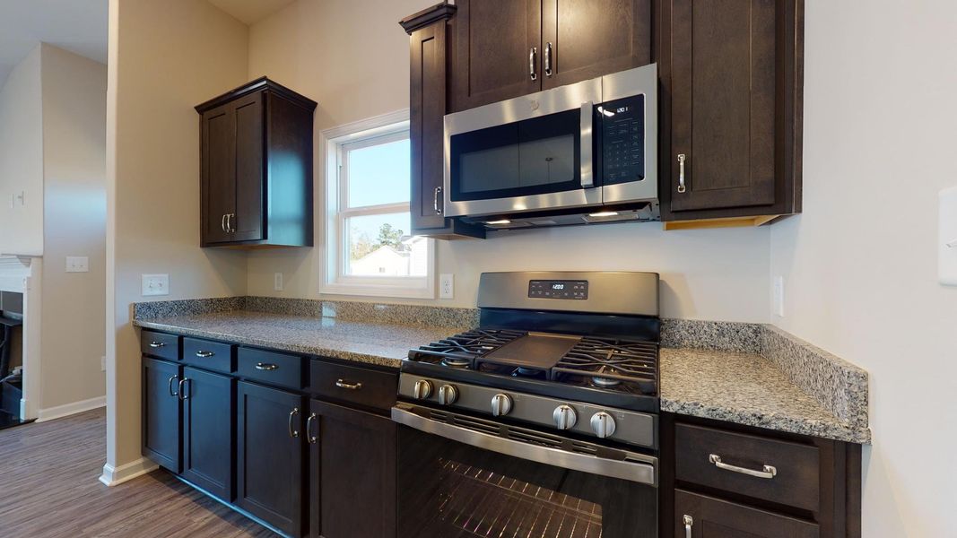 Representative furnished interior of a home built from the Corbin A by JC Jackson Homes,LLC in Heritage Pointe, Newport (Image 12).