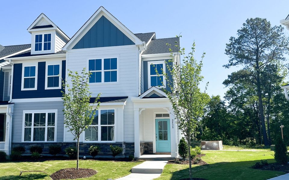Front exterior of a new home in Wendell Falls, Wendell, NC, highlighting curb appeal (Image 1). Front exterior of a new home in Wendell Falls, Wendell, NC, highlighting curb appeal (Image 1).