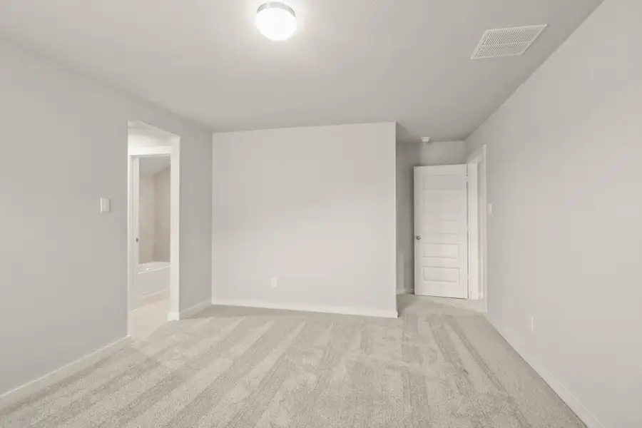 Spacious, unfurnished interior of a new home in Barton Creek Ranch, Conroe (Image 14). Spacious, unfurnished interior of a new home in Barton Creek Ranch, Conroe (Image 14).