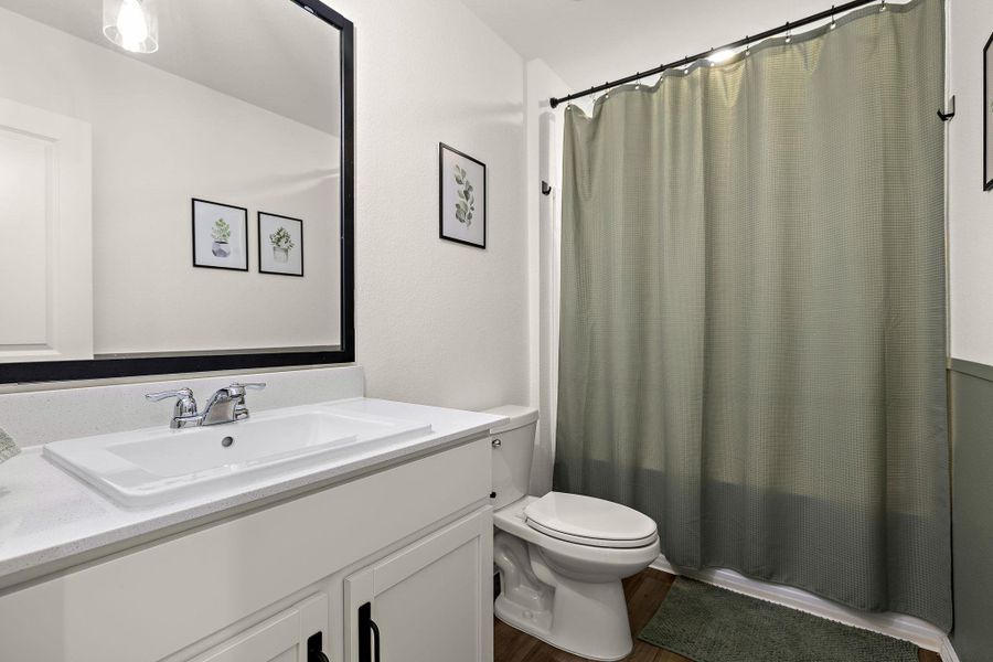 Secondary bathroom with vanity storage and a tub/shower combo. Secondary bathroom with vanity storage and a tub/shower combo.