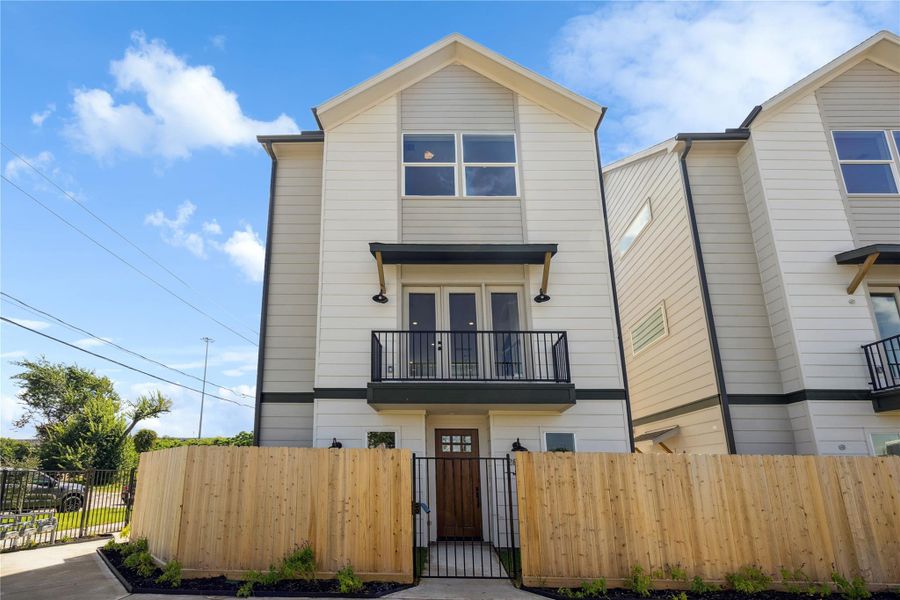 Front exterior of a new home in , Houston, TX, highlighting curb appeal (Image 2).