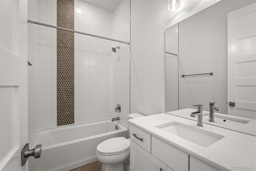 Furnished interior view inside a new home in Cloverleaf - Pinnacle Collection, Monument (Image 5).