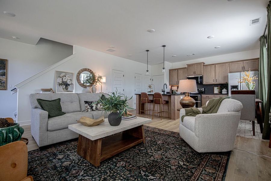 Representative furnished interior of a home built from the Provost by Grant & Co in The Townhomes at Union Depot, Bartlett (Image 14).