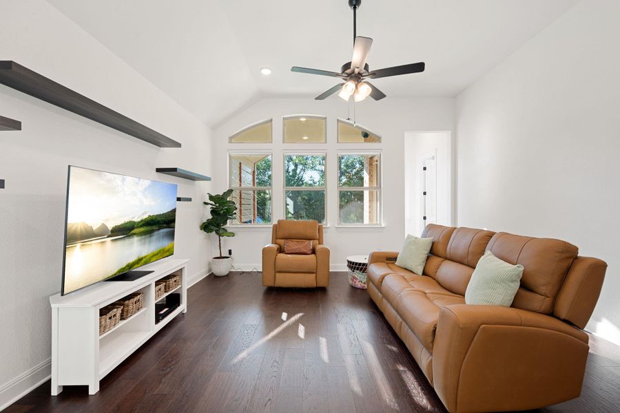 Living space boasts elegant hardwood flooring and abundant natural light. Living space boasts elegant hardwood flooring and abundant natural light.
