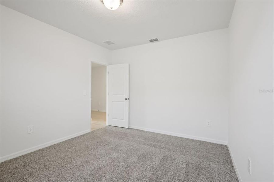 Spacious, unfurnished interior of a new home in Hamilton Bluff - Signature Series, Lake Hamilton (Image 23).