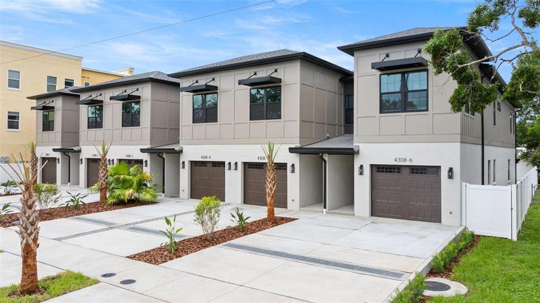 Front exterior of a new home in , Tampa, FL, highlighting curb appeal (Image 2). Front exterior of a new home in , Tampa, FL, highlighting curb appeal (Image 2).