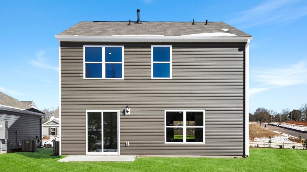 Exterior details and patio area of a home in Village Grove, Greenville (Image 21).
