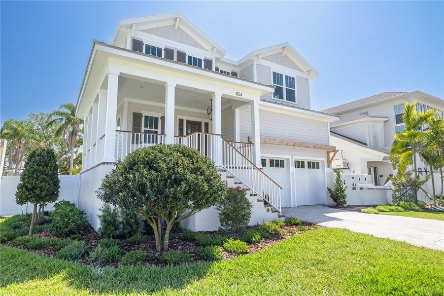 Front exterior of a new home in , St. Petersburg, FL, highlighting curb appeal (Image 2).