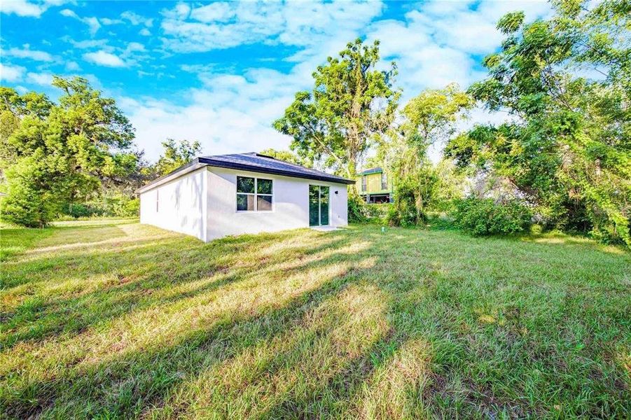Front exterior of a new home in , Haines City, FL, highlighting curb appeal (Image 2). Front exterior of a new home in , Haines City, FL, highlighting curb appeal (Image 2).